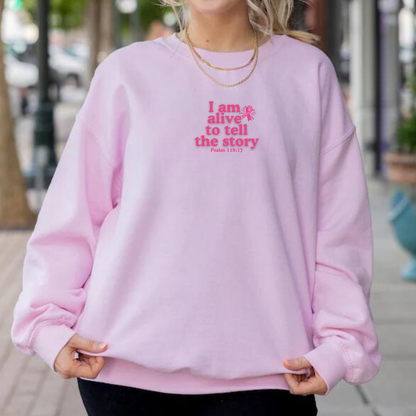 Sweater 'I Am Alive to Tell the Story' sueter, cancer de mama